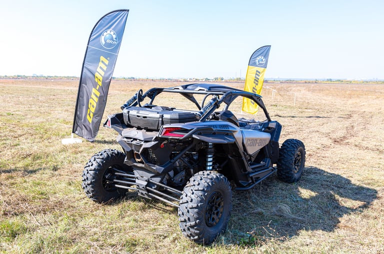 Can-Am Maverick X3 Turbo dune buggy parked in desert setting