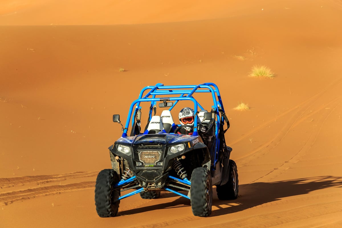 Polaris RZR 1000cc buggy in the desert available for rental in Dubai